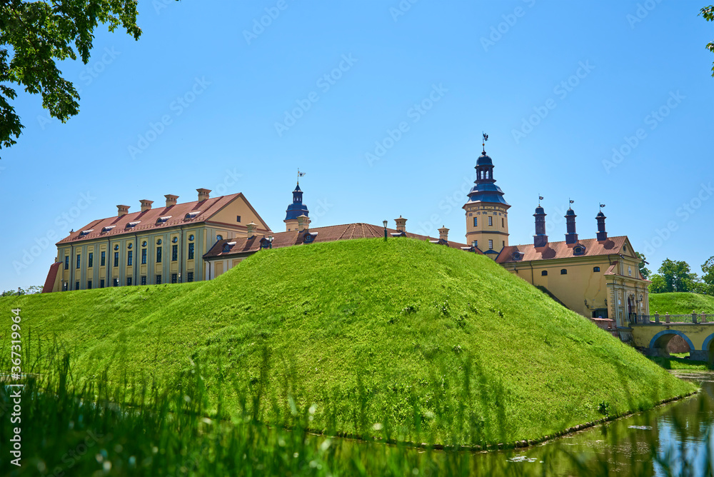 Nesvizh castle in summer day with blue sky. Tourism landmark in Belarus, cultural monument