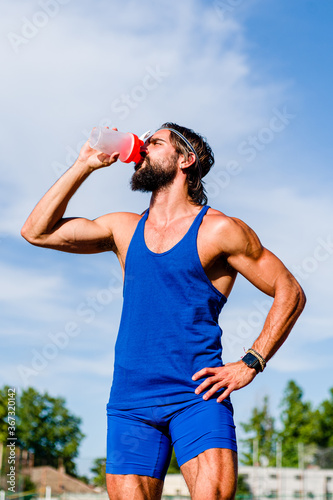 Healthy young man resting after hard workout