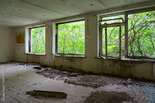 Premises of abandoned school in resettled village of Orevichi in exclusion zone of Chernobyl nuclear power plant, Belarus