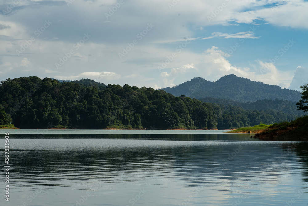 Tranquil and beautiful tropical landscape at the Kenyir Lake, Terengganu, Malaysia.