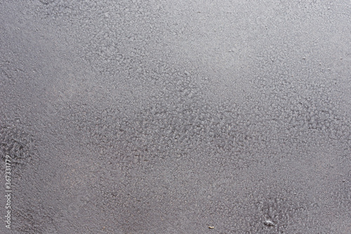 Gray soft metal surface as a background. Texture gray and solid color background with unique and beautiful grunge textures.