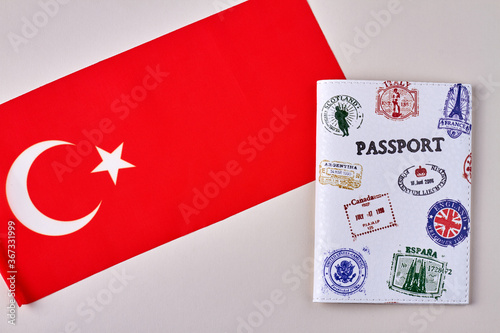 Turkish flag and passport. Turkey tourism concept. Isolated on white background. photo