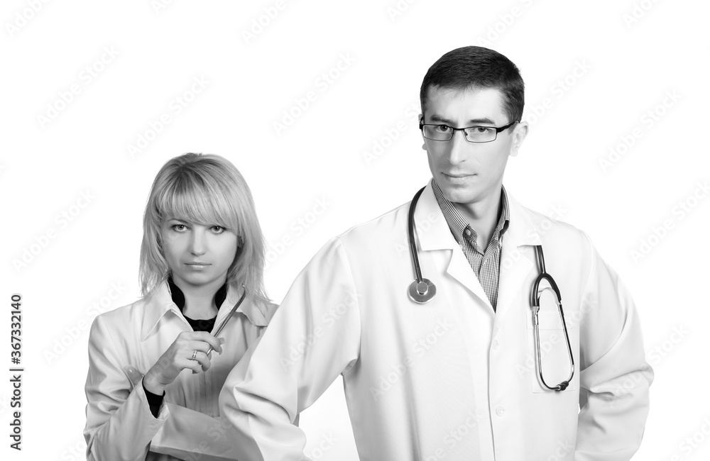 Man and woman in white coats of doctors with stethoscopes on a white background in isolation