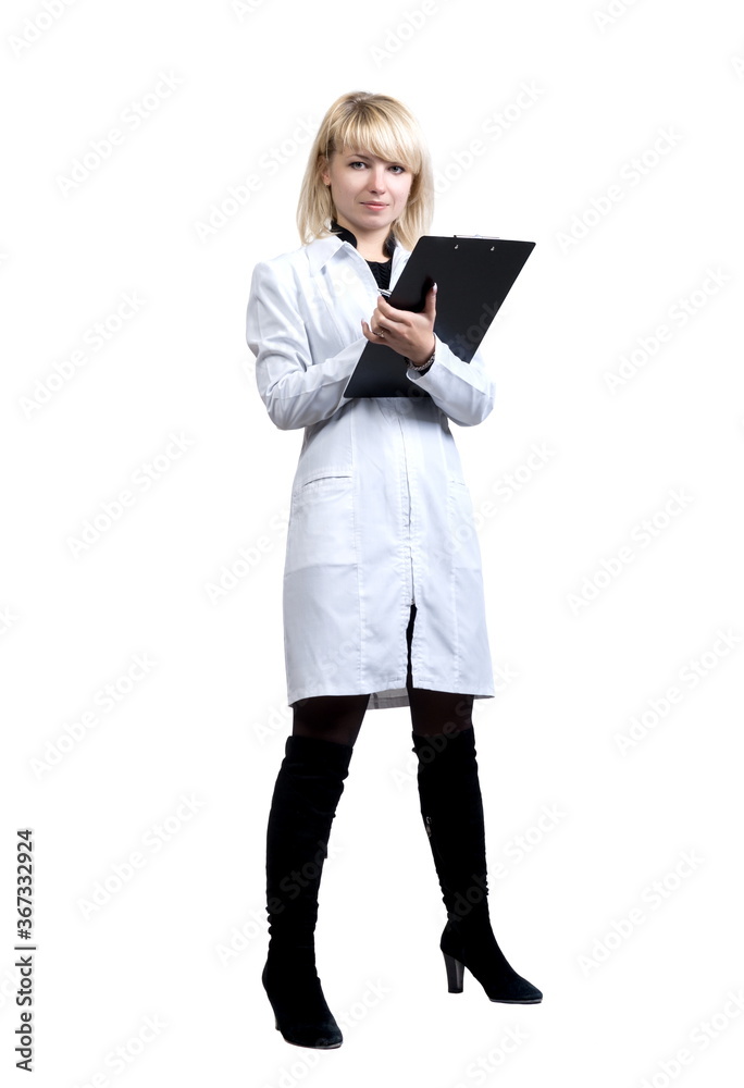 Woman in a white doctor’s suit makes a record, on a white background in isolation Woman in a white doctor’s suit makes a record, on a white background in isolation
