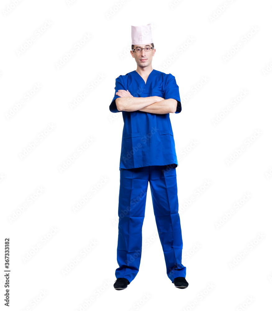 A man in a blue doctor suit and cap on a white background, isolated A man in a blue doctor suit and cap on a white background, isolated