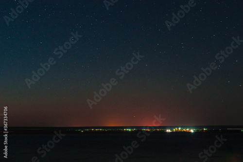 Night lights of the city standing on the black sea coast