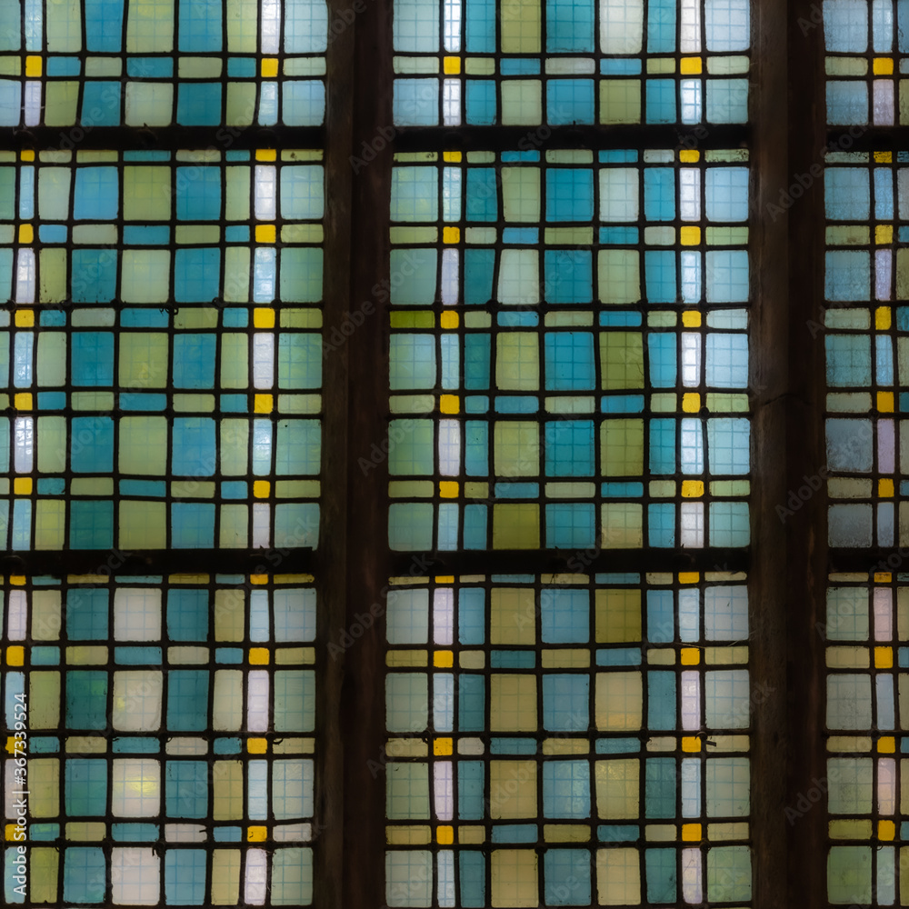 stained glass windows of the church in the parish enclosure of Lampaul Guimiliau, in Brittany