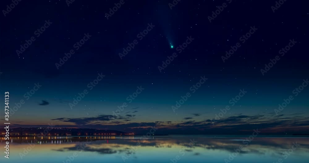 Comet Neowise with stars over river time lapse
Comet Neowise with stars over river time lapse