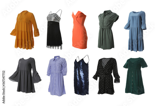 Photographie Set of different stylish dresses on white background