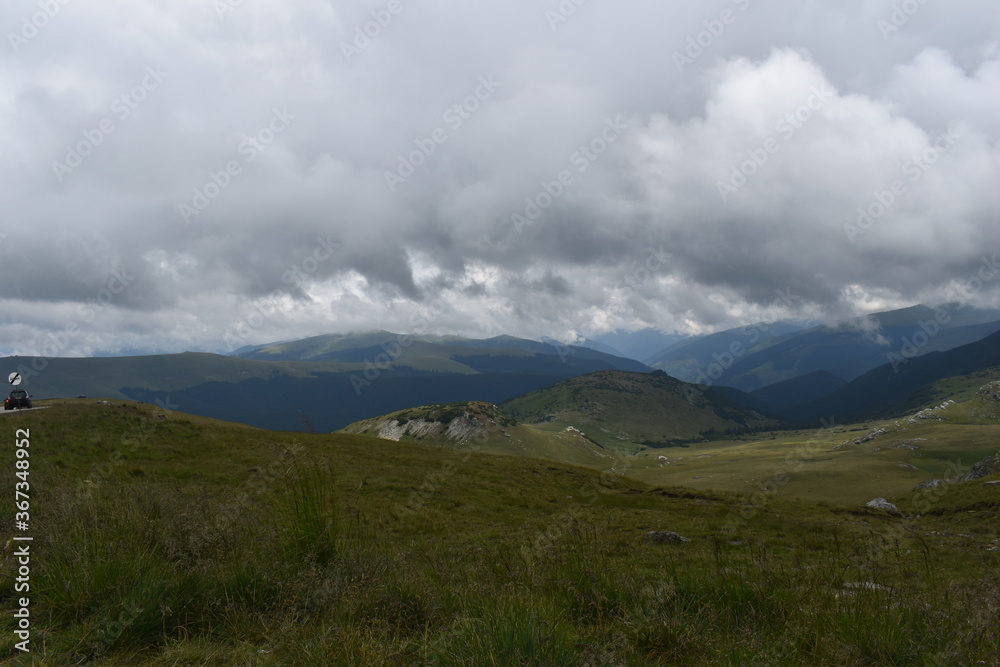 Fototapeta premium clouds over the mountains