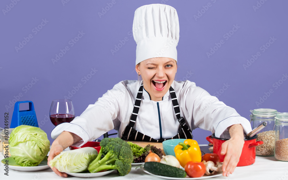Commit to be fit. Chef cook in commercial kitchen. Professional chef with healthy products. Happy smiling chef preparing meal with various vegetables. ready to cook new dish. Fresh vegetarian salad