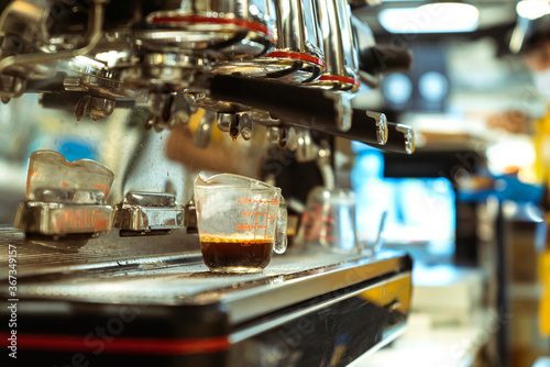close up of barista working makeing coffee with coffee machine image color tone abstract blur background