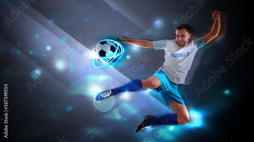 Shot of football player in action. Creative banner design © New Africa