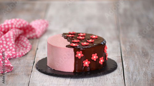 Strawberry Mousse Cake with Mirror Glaze and Sugar Flowers.