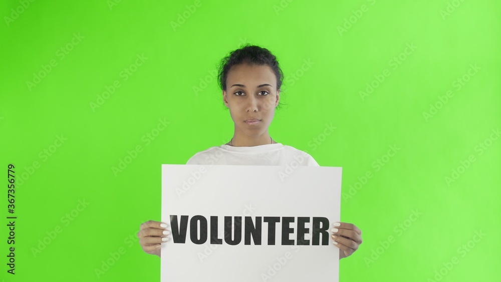 Afro-American Girl Activist With Volunteer Poster on chroma key background Afro-American Girl Activist With Volunteer Poster on chroma key background