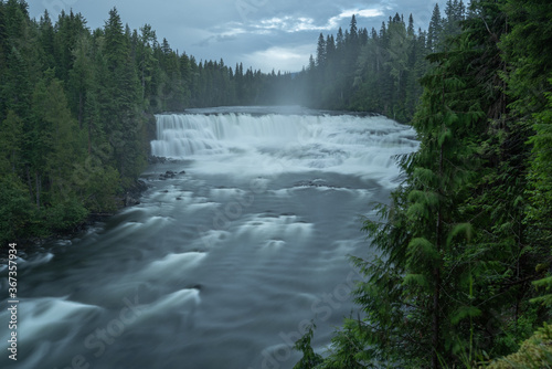 Clearwater river in Wells Gray Park Canada  small waterfall with rough water and trees