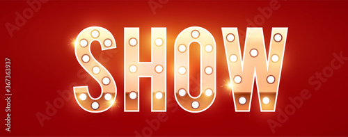 Gold show sign with retro light bulbs, stars and fireworks.