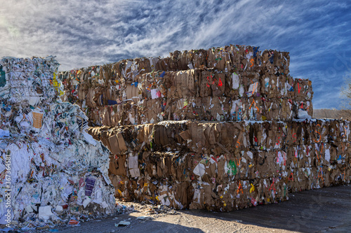 Bales of cardboard and box board. Waste paper for Recycling. Background of paper textures, Paper garbage at the recycling plant
