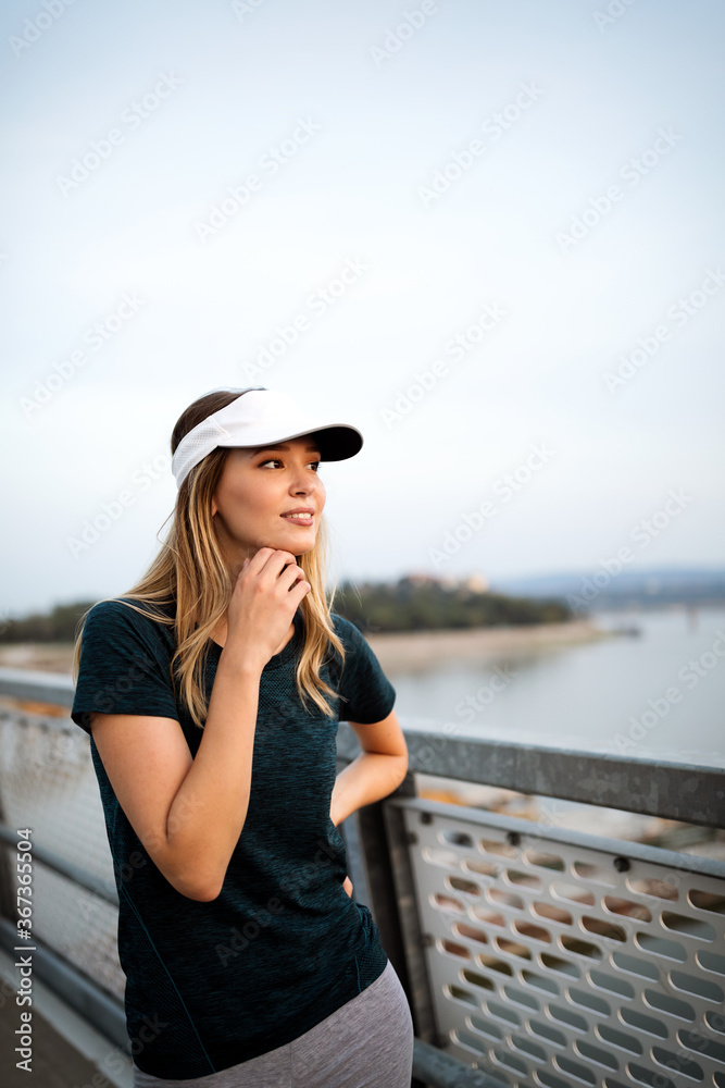 Portrait of fit and sporty young woman