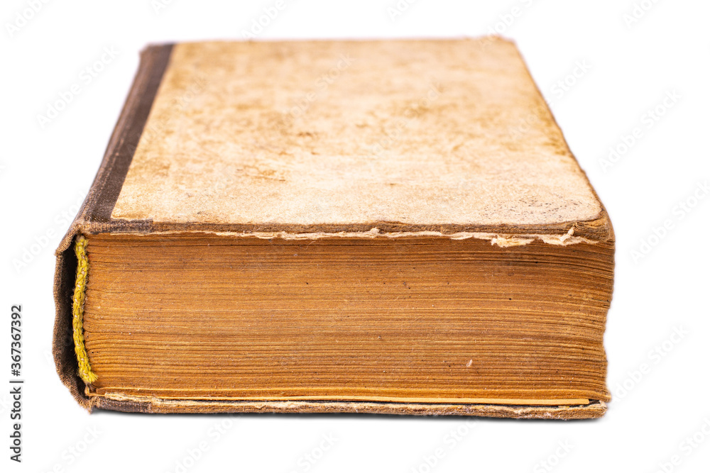 an old battered reading book isolated on a white background an old battered reading book isolated on a white background