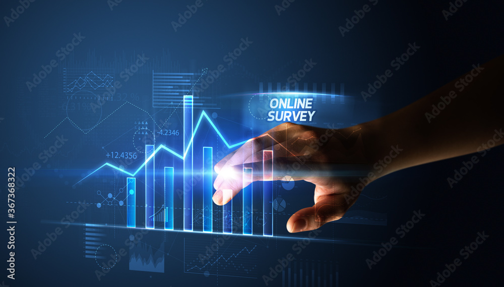 Hand touching ONLINE SURVEY button, business concept Hand touching ONLINE SURVEY button, business concept