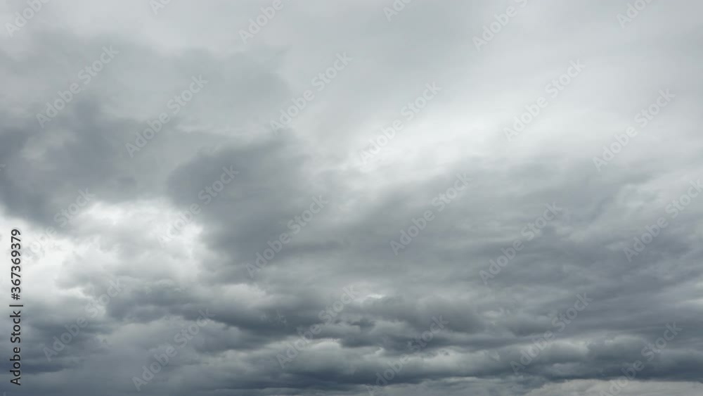 Sky with black clouds before a summer rainstorm. 4K footage. Sky with black clouds before a summer rainstorm. 4K footage.