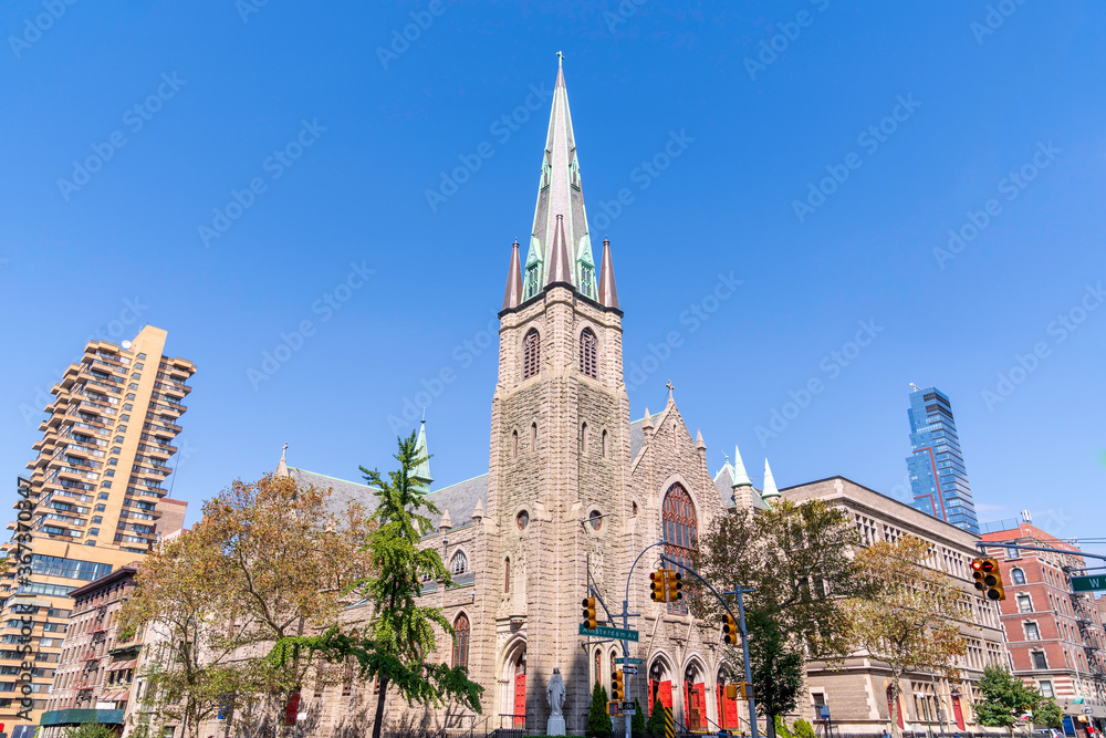 The Holy Name of Jesus Roman Catholic Church is located at W96th St at the corner of Amsterdam Avenue Manhattan , New York City. The statue of Virgin Mary stands at the corner of Amsterdam Avenue.