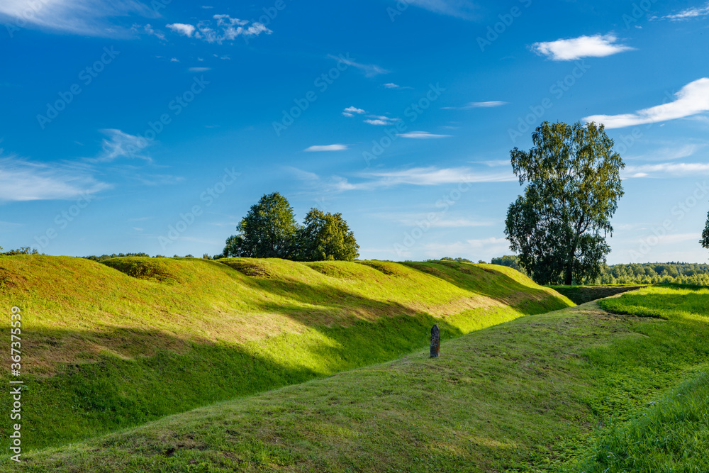 Obraz premium Earthen fortifications, redoubts and flashes at the site of a bloody battle during the war of 1812, on the Borodino field.