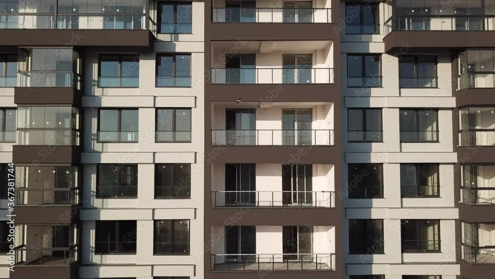 Aerial view of multi-storey apartment building. the flats are completed and ready for sale. Elevator shot Aerial view of multi-storey apartment building. the flats are completed and ready for sale. Elevator shot