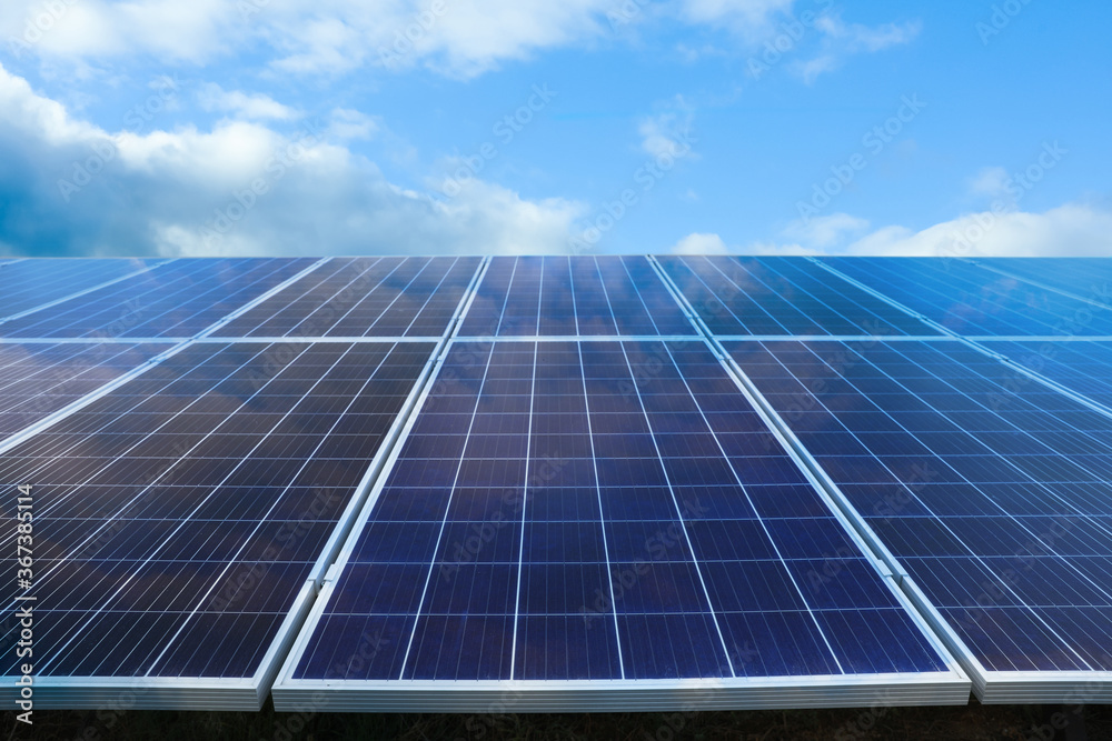 Solar panels against blue sky. Alternative energy source Solar panels against blue sky. Alternative energy source