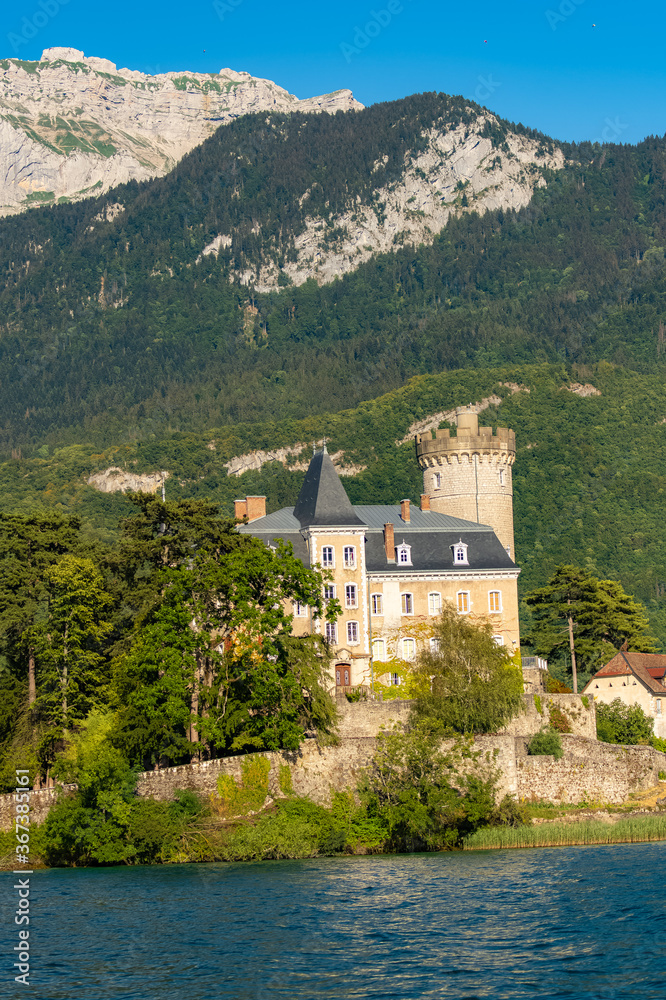 Fototapeta premium Annecy in France, the Duingt castle on the lake, and the Saint-Jorioz village 