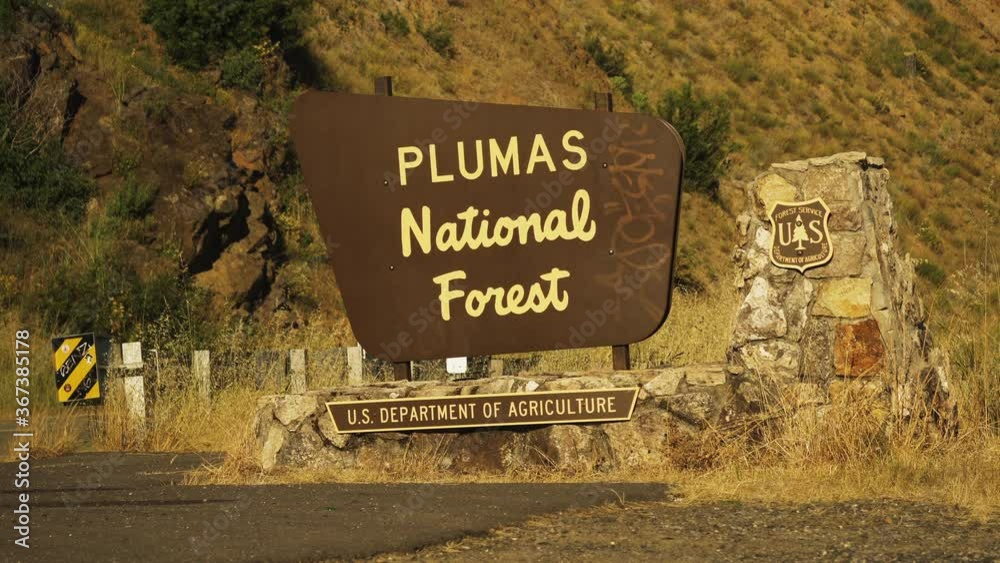 Entrance sign of Plumas National Forest, nature park in USA, static