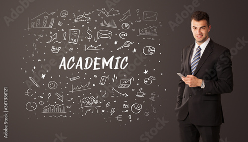 Businessman thinking with ACADEMIC inscription, business education concept