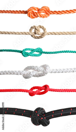 Set of different ropes with knots on white background