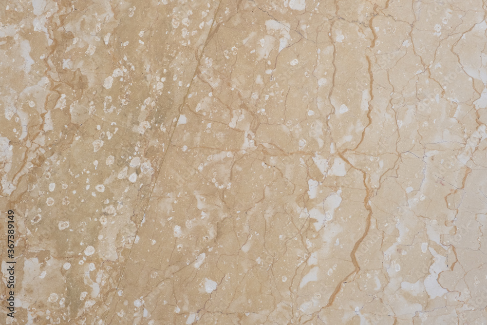 Fototapeta premium Brown and beige granite texture. Stone background. Polished natural granite slab. 