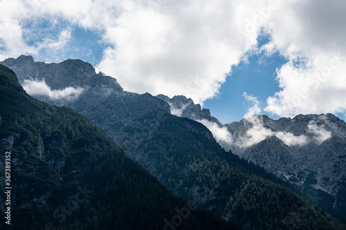 Mountain landscape under the blue cloudy sky