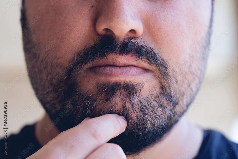 Obraz premium the young man is getting older now and his beard is white