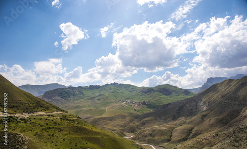 Fototapeta Naklejka Na Ścianę i Meble -  Beautiful landscape in the mountains at summer in daytime. Mountains at the sunset time. Azerbaijan, Caucasus. Khinalig