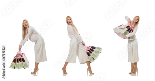 Woman with shopping bags on white