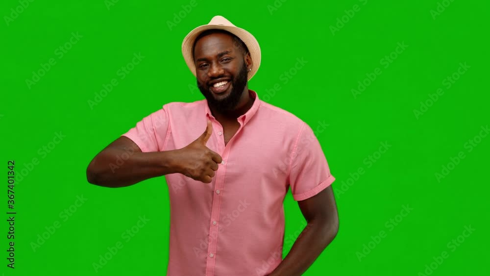 I recommend. Positive black unshaven man shows thumb up, really likes. Alpha channel I recommend. Positive black unshaven man shows thumb up, really likes. Alpha channel