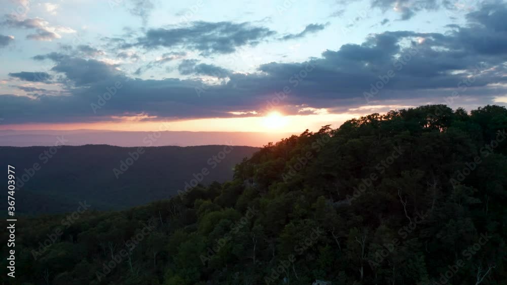 An aerial shot (dolly in) during sunset above Duncan Knob in the Massanutten Range in George Washington National Forest in Page County, VA. An aerial shot (dolly in) during sunset above Duncan Knob in the Massanutten Range in George Washington National Forest in Page County, VA.