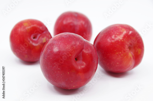 Plums isolated on a white background. Fresh plum. Closeup