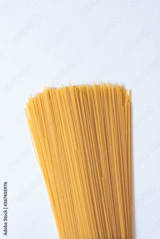 Italian pasta (macaroni) isolated on white background. Space for text. Italian pasta (macaroni) isolated on white background. Space for text.