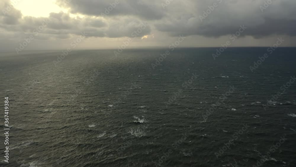 Vast Ocean Horizon in Denmark and Thick Heavy Clouds in Background Vast Ocean Horizon in Denmark and Thick Heavy Clouds in Background