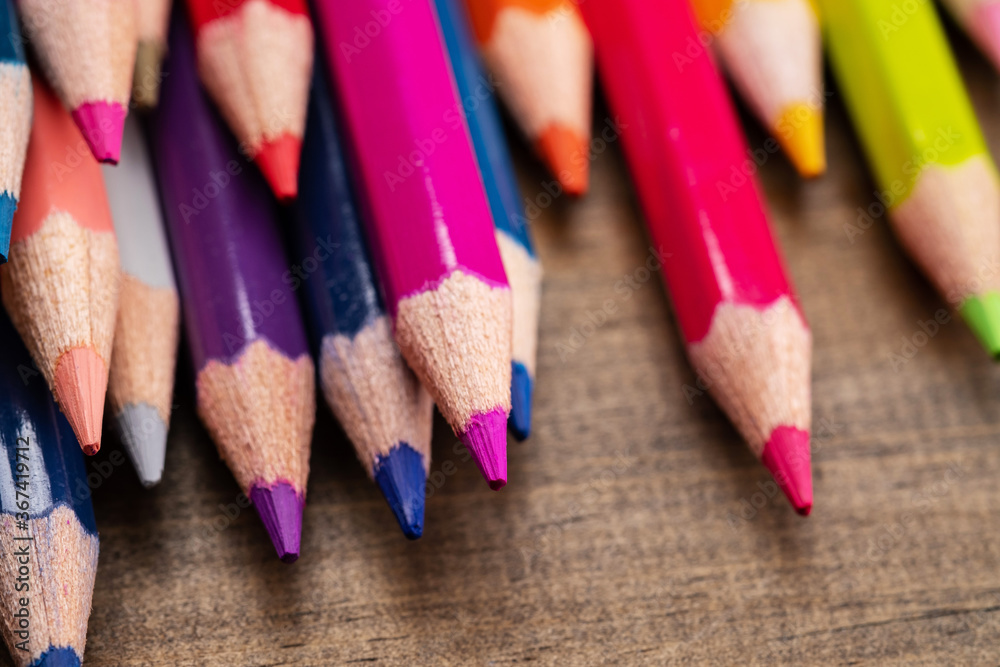 color pencil on wood background, back to school concept
color pencil on wood background, back to school concept