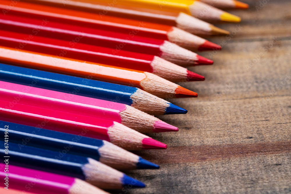 color pencil on wood background, back to school concept
color pencil on wood background, back to school concept