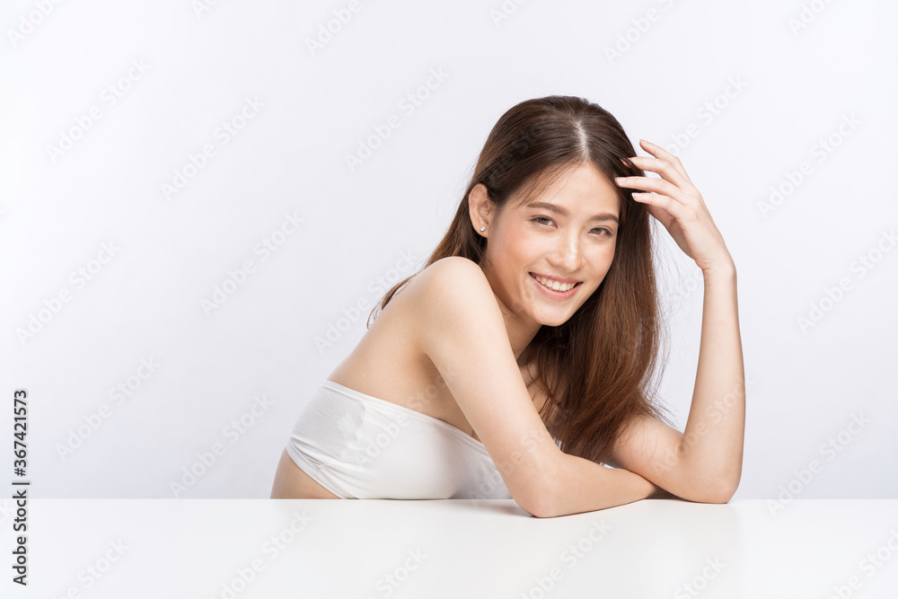 Young Asian Woman with Clean Fresh Skin. Face care, Facial treatment, Cosmetology, beauty and healthy skin and cosmetic concept, woman beauty skin isolated on white background Young Asian Woman with Clean Fresh Skin. Face care, Facial treatment, Cosmetology, beauty and healthy skin and cosmetic concept, woman beauty skin isolated on white background