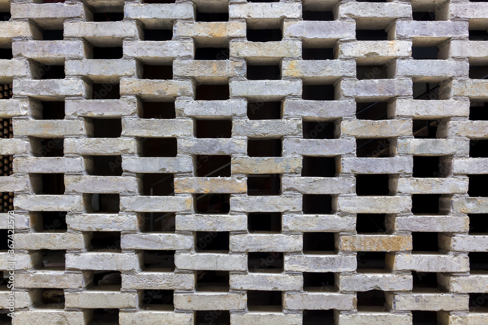 black hole and brick wall background texture, part of traditional Chinese brick window lattice in the southeast of China black hole and brick wall background texture, part of traditional Chinese brick window lattice in the southeast of China