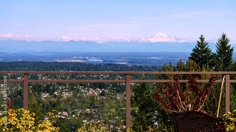 Fototapeta premium stunning vista across Fraser Valley, BC, with a rose-tinged Mount Baker on horizon