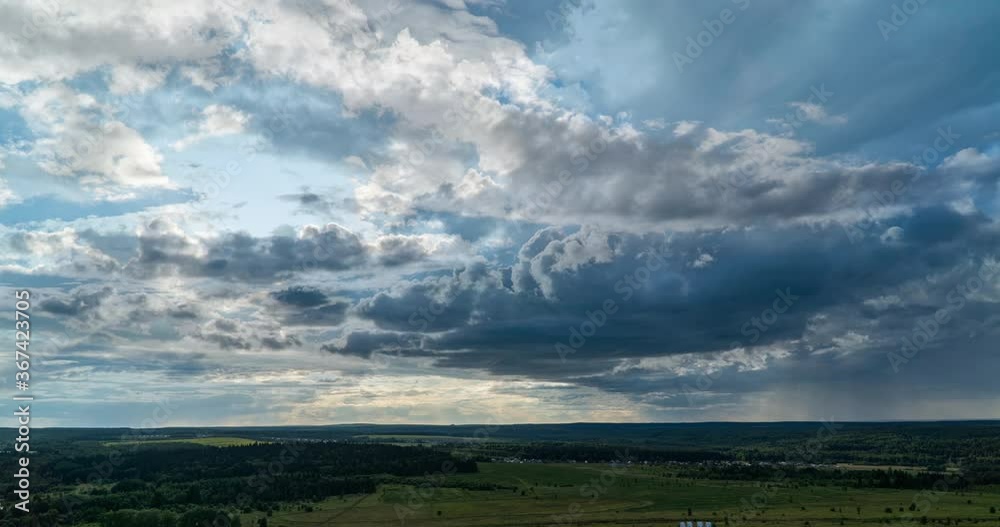 simultaneous movement of clouds of different levels, time intervals, beautiful pre-sunset landscape loop video simultaneous movement of clouds of different levels, time intervals, beautiful pre-sunset landscape loop video